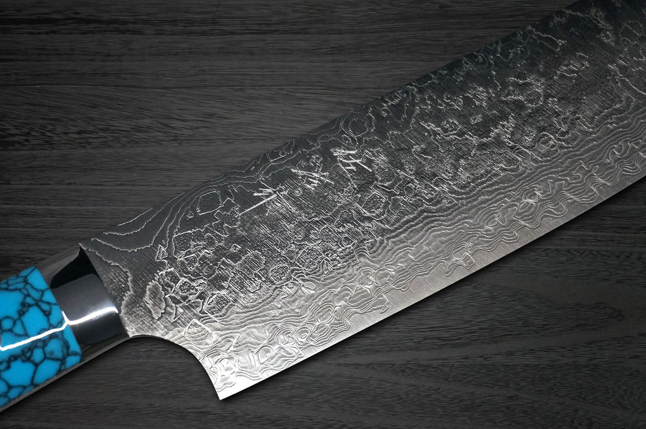 https://cdn11.bigcommerce.com/s-attnwxa/images/stencil/original/products/4090/166441/takeshi-saji-takeshi-saji-r2-diamond-finish-damascus-tca-japanese-chefs-nakirivegetable-170mm-with-blue-turquoise-handle__21567.1624952009.jpg?c=2&imbypass=on&imbypass=on