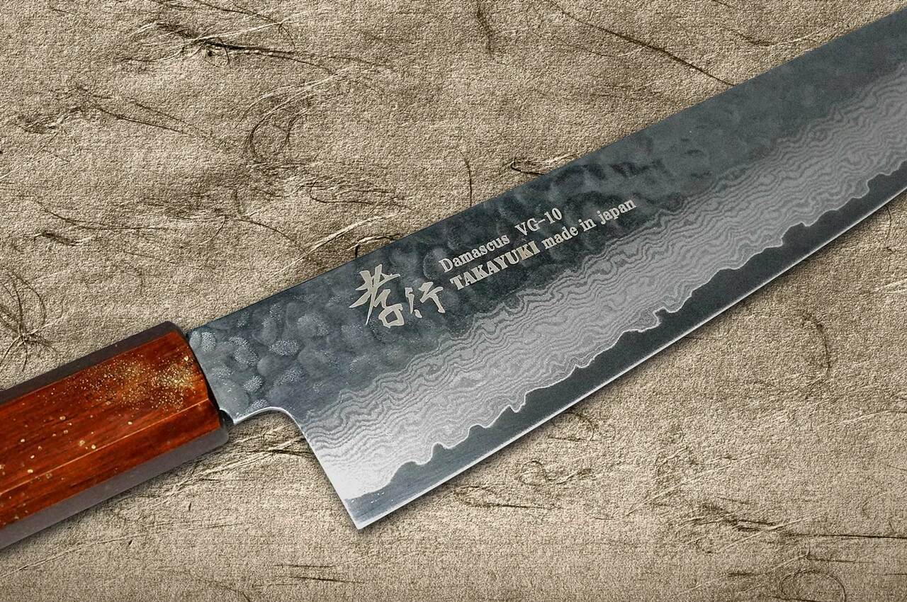 https://cdn11.bigcommerce.com/s-attnwxa/images/stencil/original/products/4102/172269/sakai-takayuki-sakai-takayuki-33-layer-vg10-damascus-urushi-chefs-santoku-knife-170mm-with-japanese-lacquered-oak-handle-seiren__34295.1627546786.jpg?c=2&imbypass=on&imbypass=on