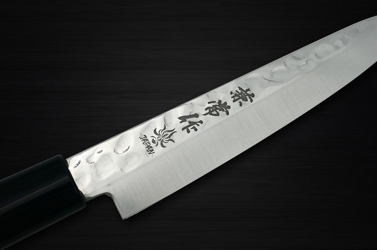 https://cdn11.bigcommerce.com/s-attnwxa/images/stencil/original/products/4360/217012/kanetsune-kc-950-dsr-1k6-stainless-hammered-japanese-chefs-petty-knifeutility-120mm__28273.1670446836.jpg?c=2&imbypass=on&imbypass=on