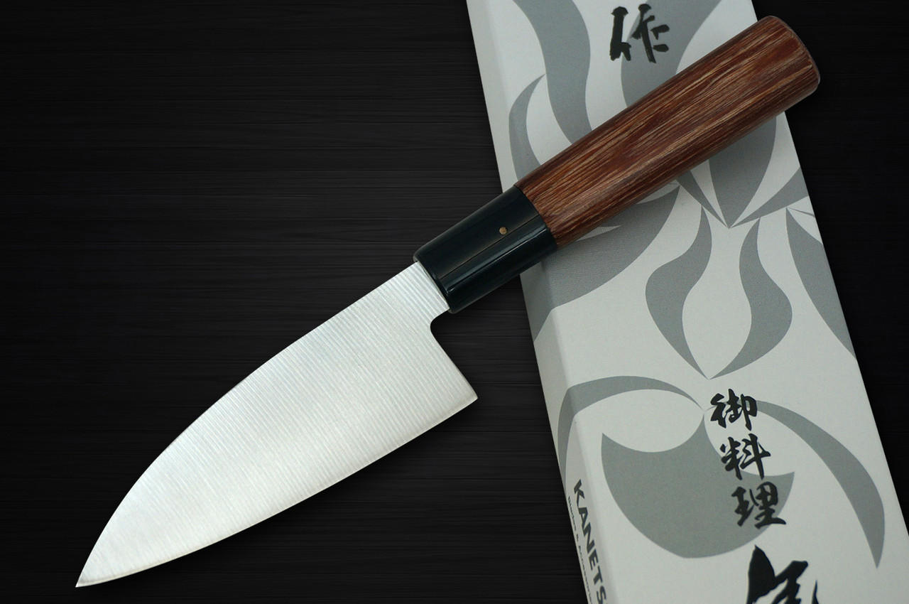 https://cdn11.bigcommerce.com/s-attnwxa/images/stencil/original/products/4362/217041/kanetsune-kc-950-dsr-1k6-stainless-hammered-japanese-chefs-mini-deba-105mm__35833.1670446870.jpg?c=2&imbypass=on&imbypass=on