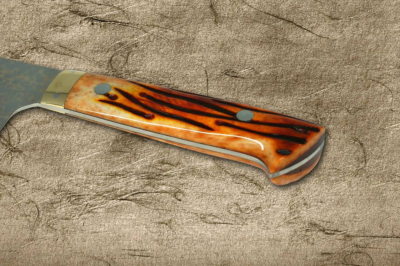 https://cdn11.bigcommerce.com/s-attnwxa/images/stencil/original/products/4868/196531/takeshi-saji-vg10-colored-damascus-dho-japanese-chefs-santoku-knife-180mm-with-orange-antler-handle__86274.1651415079.jpg?c=2&imbypass=on&imbypass=on
