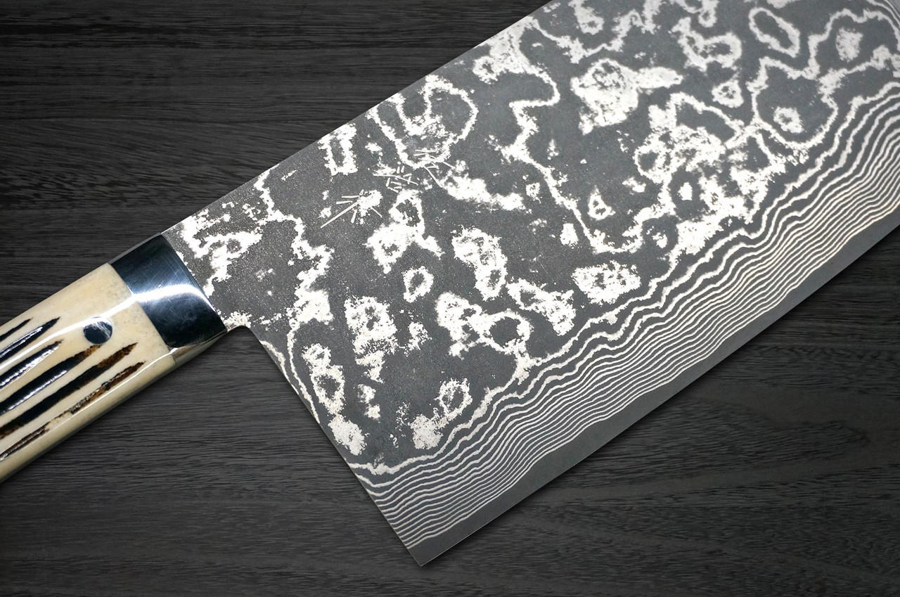 https://cdn11.bigcommerce.com/s-attnwxa/images/stencil/original/products/5369/208302/takeshi-saji-vg10-black-damascus-dhw-japanese-chefs-chinese-cooking-knife-220mm-with-white-antler-handle__71191.1663439619.jpg?c=2&imbypass=on&imbypass=on