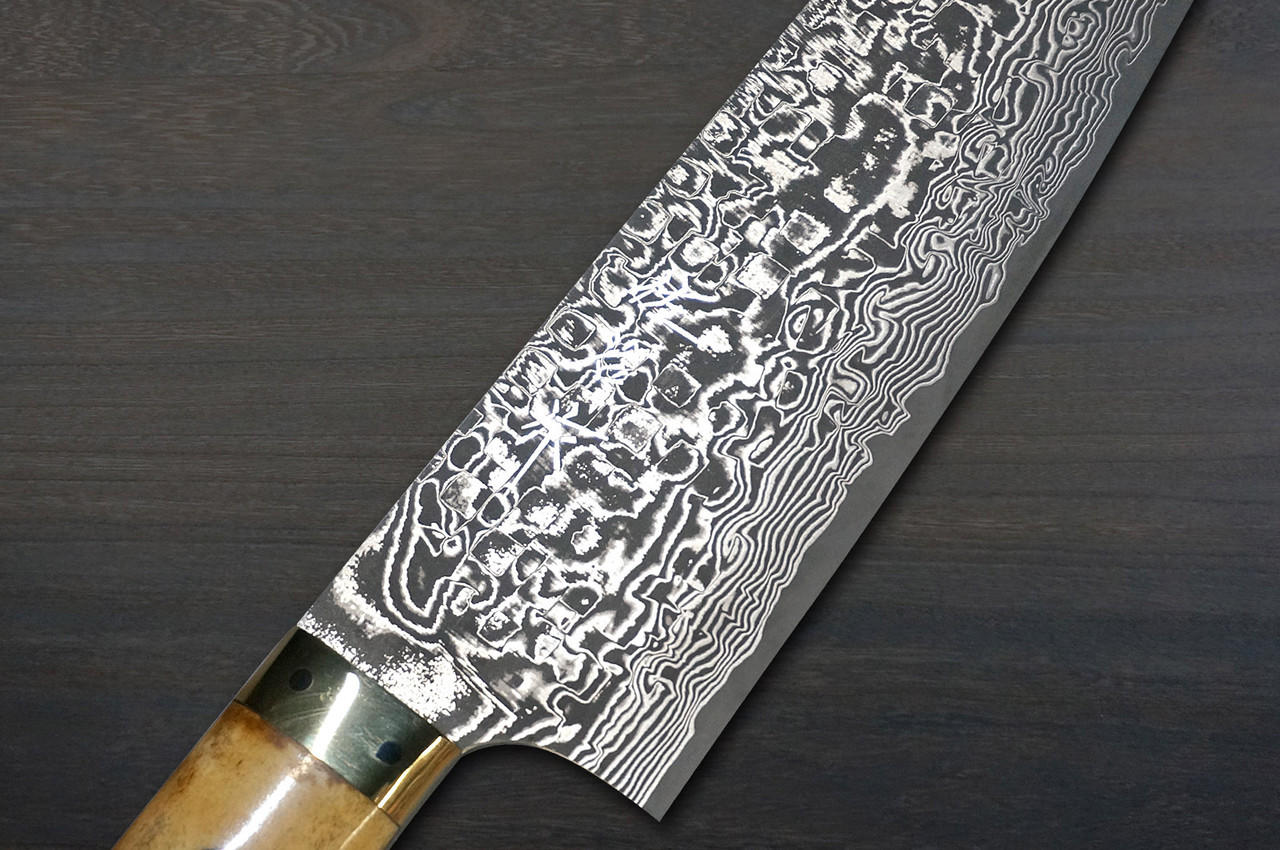https://cdn11.bigcommerce.com/s-attnwxa/images/stencil/original/products/5605/218654/takeshi-saji-r2sg2-black-damascus-dhm-japanese-chefs-bunka-knife-180mm-with-brown-antler-handle__19315.1673128189.jpg?c=2&imbypass=on&imbypass=on