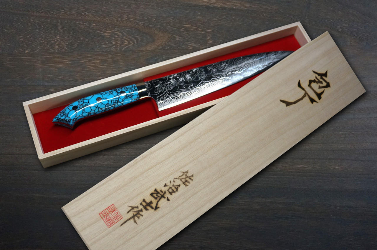 https://cdn11.bigcommerce.com/s-attnwxa/images/stencil/original/products/5889/229230/takeshi-saji-r2-diamond-finish-damascus-nnm-japanese-chefs-gyuto-knife-210mm-with-blue-turquoise-handle-nomura-special__50732.1689220298.jpg?c=2&imbypass=on&imbypass=on