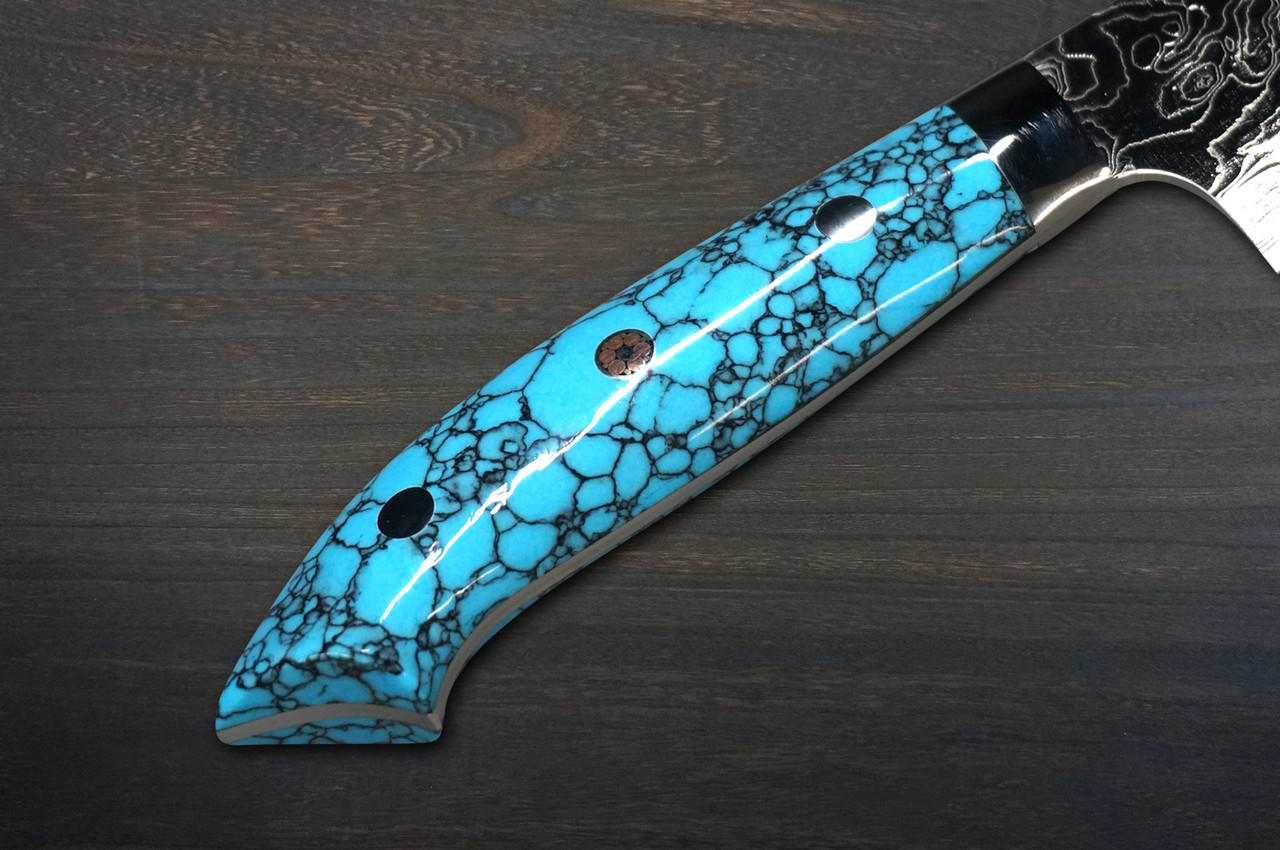 https://cdn11.bigcommerce.com/s-attnwxa/images/stencil/original/products/5889/229253/takeshi-saji-r2-diamond-finish-damascus-nnm-japanese-chefs-gyuto-knife-210mm-with-blue-turquoise-handle-nomura-special__42112.1689220325.jpg?c=2&imbypass=on&imbypass=on