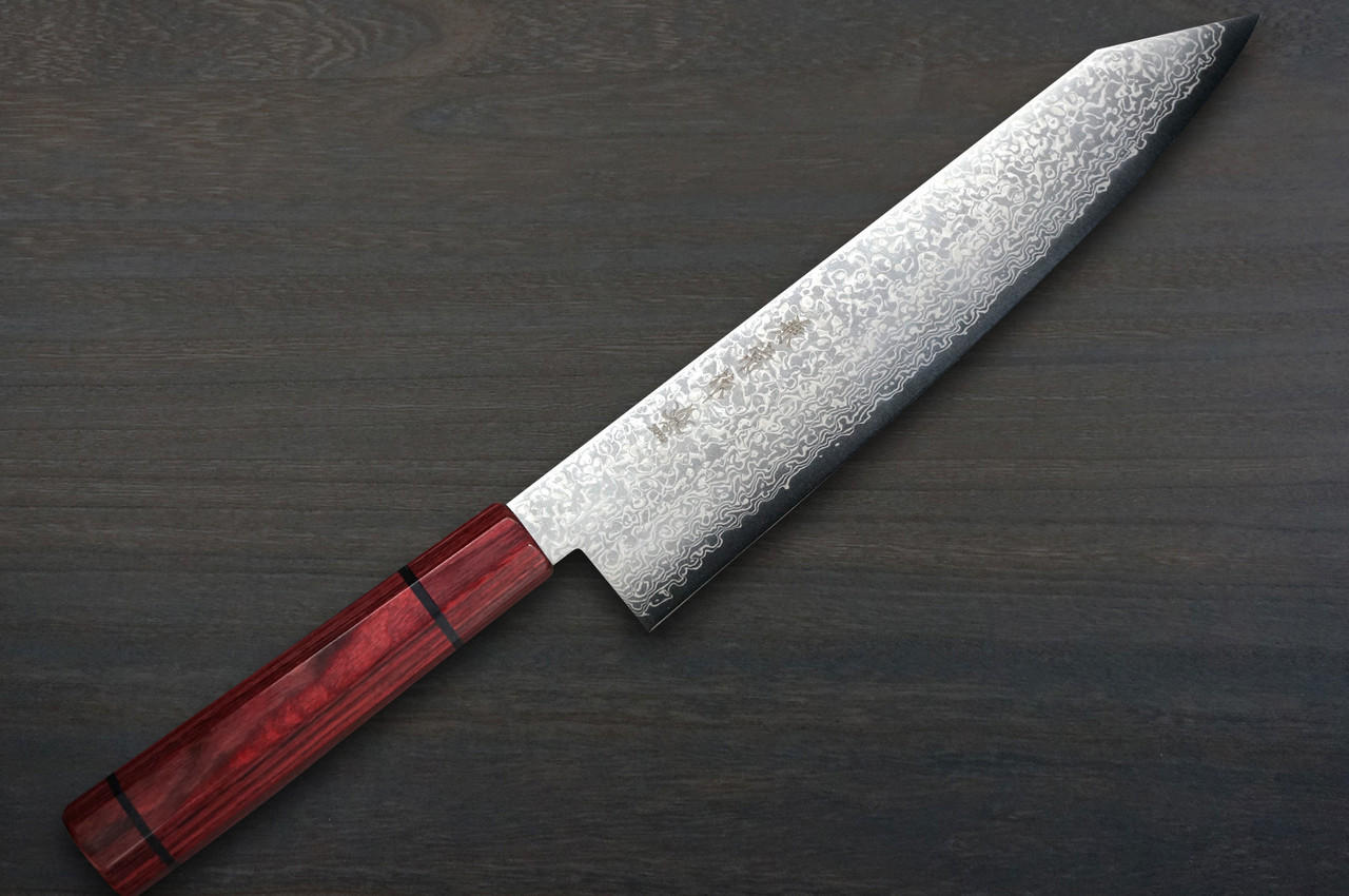 https://cdn11.bigcommerce.com/s-attnwxa/images/stencil/original/products/5981/232306/kanetsune-63-layer-damascus-minamo-kaze-japanese-chefs-kiritsuke-gyuto-knife-210mm__32565.1696313420.jpg?c=2&imbypass=on&imbypass=on