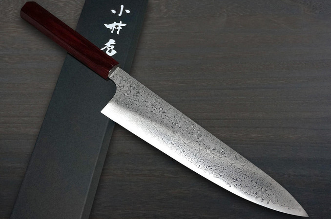 https://cdn11.bigcommerce.com/s-attnwxa/products/4673/images/210032/kei-kobayashi-r2-damascus-special-finished-cs-japanese-chefs-gyuto-knife-240mm-black-with-red-lacquered-wood-handle__84163.1665256645.720.450.jpg?c=2