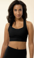 Front view of the Anuri EcoForm Recycled Longline Sports Bra in Ebony, featuring a modern scoop neckline and a supportive, structured crop silhouette.