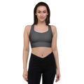 Front view of the Anuri EcoForm Recycled Longline Sports Bra in dark gull gray, featuring a modern scoop neckline and a supportive, structured crop silhouette.