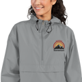 Anuri Momentum packable windbreaker with embroidered logo and drawstring hood