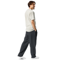 Male model wearing Anuri Shadow Form Men’s Wide-Leg Recycled Joggers in dark stealth grey.