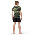 athlete wearing the Anuri Flow Earth Men's Recycled Rash Guard in a green forest camouflage pattern.