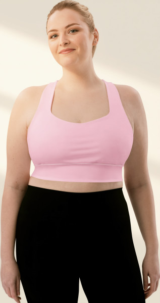 Front view of the Anuri EcoForm Recycled Longline Sports Bra in Primrose Pink, featuring a modern scoop neckline and a supportive, structured crop silhouette.