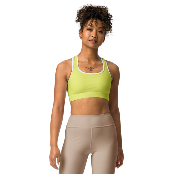 Front view of the Anuri Kinetic Racerback Sports Bra in Lemon Grass displaying the double-layered front panel and white contrast trim.