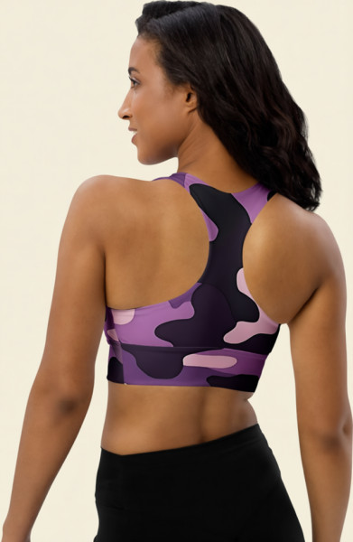 Back view of model wearing the Anuri ShadowForm Purple Camo Recycled Longline Sports Bra with supportive racerback design and purple camouflage print