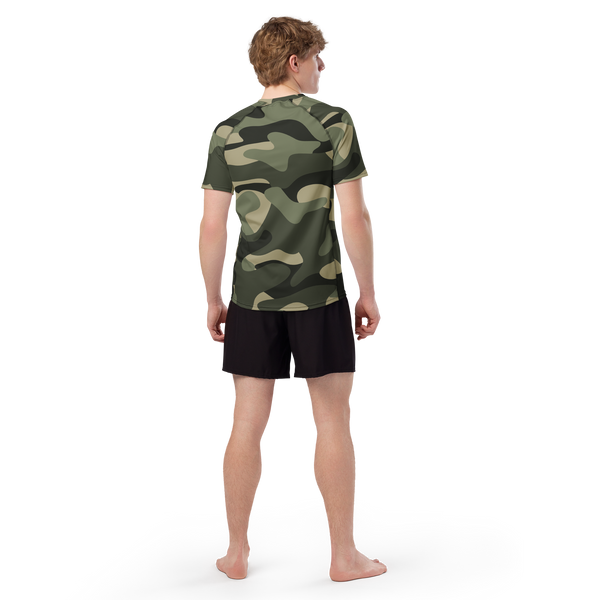 athlete wearing the Anuri Flow Earth Men's Recycled Rash Guard in a green forest camouflage pattern.