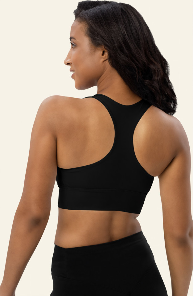Back view of the Anuri EcoForm Recycled Longline Sports Bra in Ebony, showcasing the sleek athletic racerback cut and extended compression underband.
