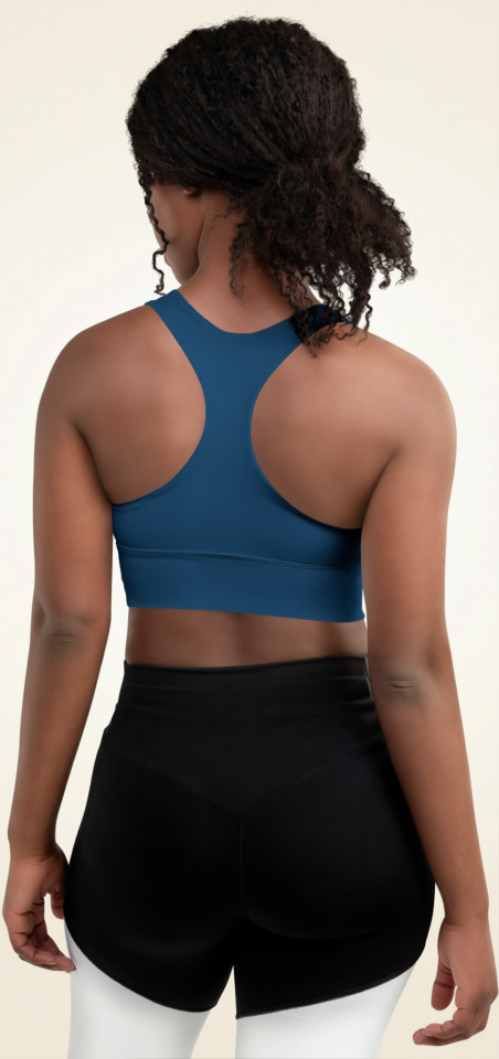 Back view of the Anuri EcoForm Recycled Longline Sports Bra in Crown Blue, showcasing the sleek athletic racerback cut and extended compression underband.