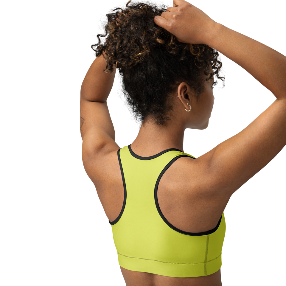 Whether you're hitting the yoga mat, going for a run, or engaging in high-intensity training, the Anuri Kinetic Racerback Sports Bra showcasing the supportive racerback cut and flatlock stitching details.