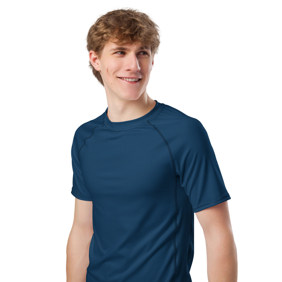 Model wearing crown blue eco-performance rash guard – premium UPF 50+ moisture-wicking workout shirt by Anuri.