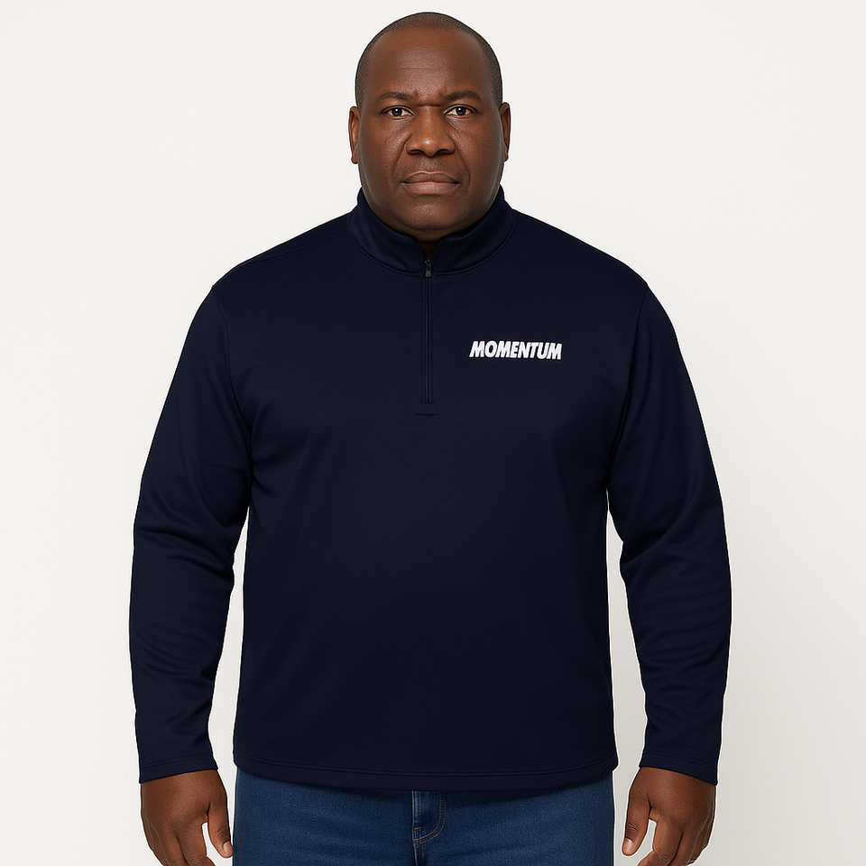 Model wearing true navy quarter-zip pullover with “Momentum” logo on chest – moisture-wicking, odor-resistant activewear by Anuri Activewear.