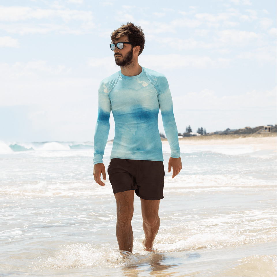 Man wearing long-sleeve men’s sun rash guard – slim-fit UV protective activewear by Anuri Activewear.