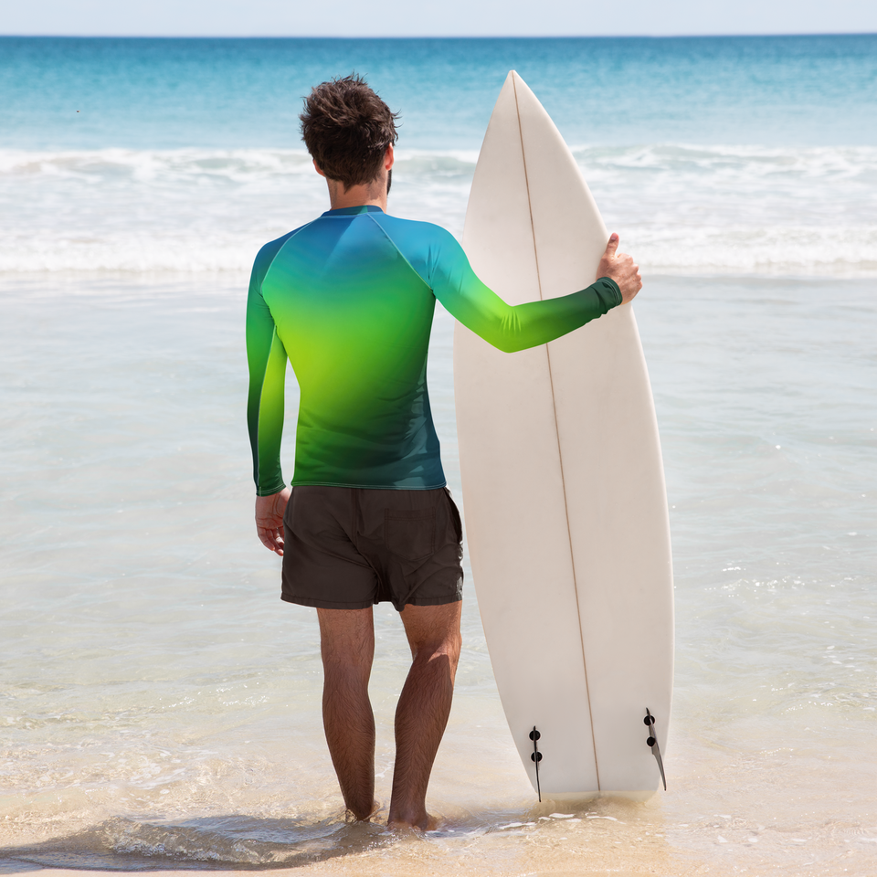 Man wearing a blue and green long-sleeve men’s sun rash guard – slim-fit UV protective activewear by Anuri Activewear.
