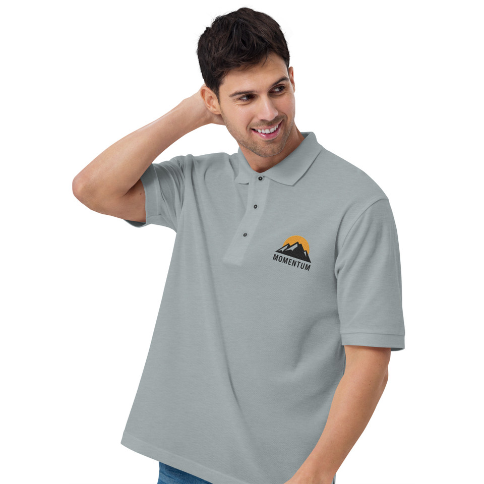 Model wearing Port Authority embroidered polo shirt – relaxed fit, classic performance style by Anuri.