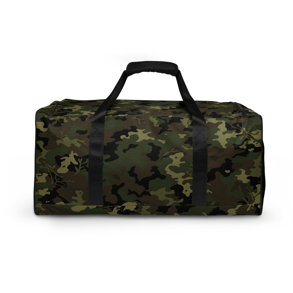 a spacious duffle bag featuring a classic green, brown, and black military camouflage pattern. It has black padded handles and a black adjustable shoulder strap.