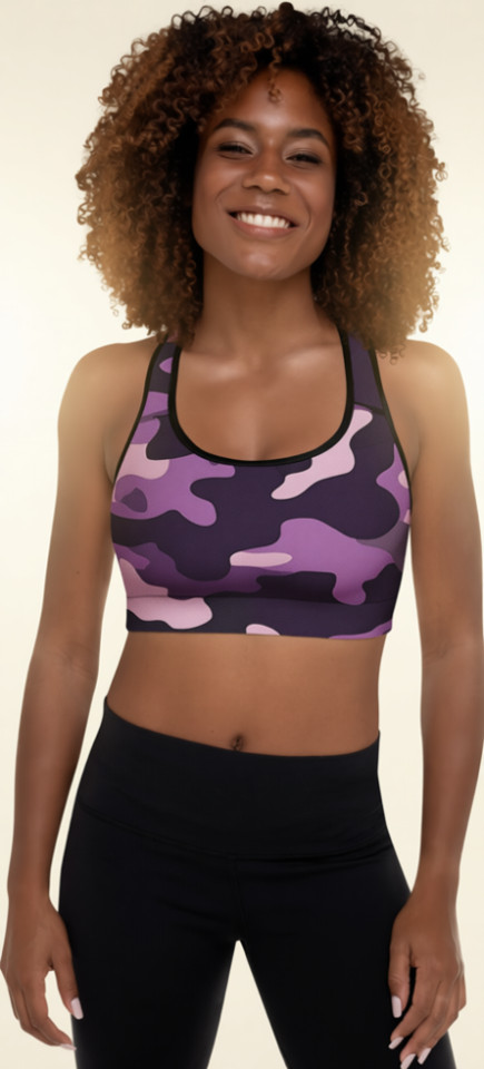 Woman wearing Anuri ShadowForm Camo Padded Sports Bra in purple and black camouflage print with racerback athletic design