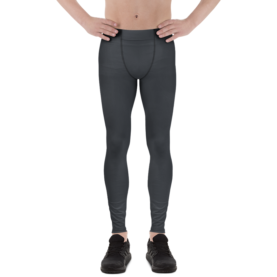Male model wearing Anuri Shadow Form Men’s Tactical Recycled Leggings in stealth grey.