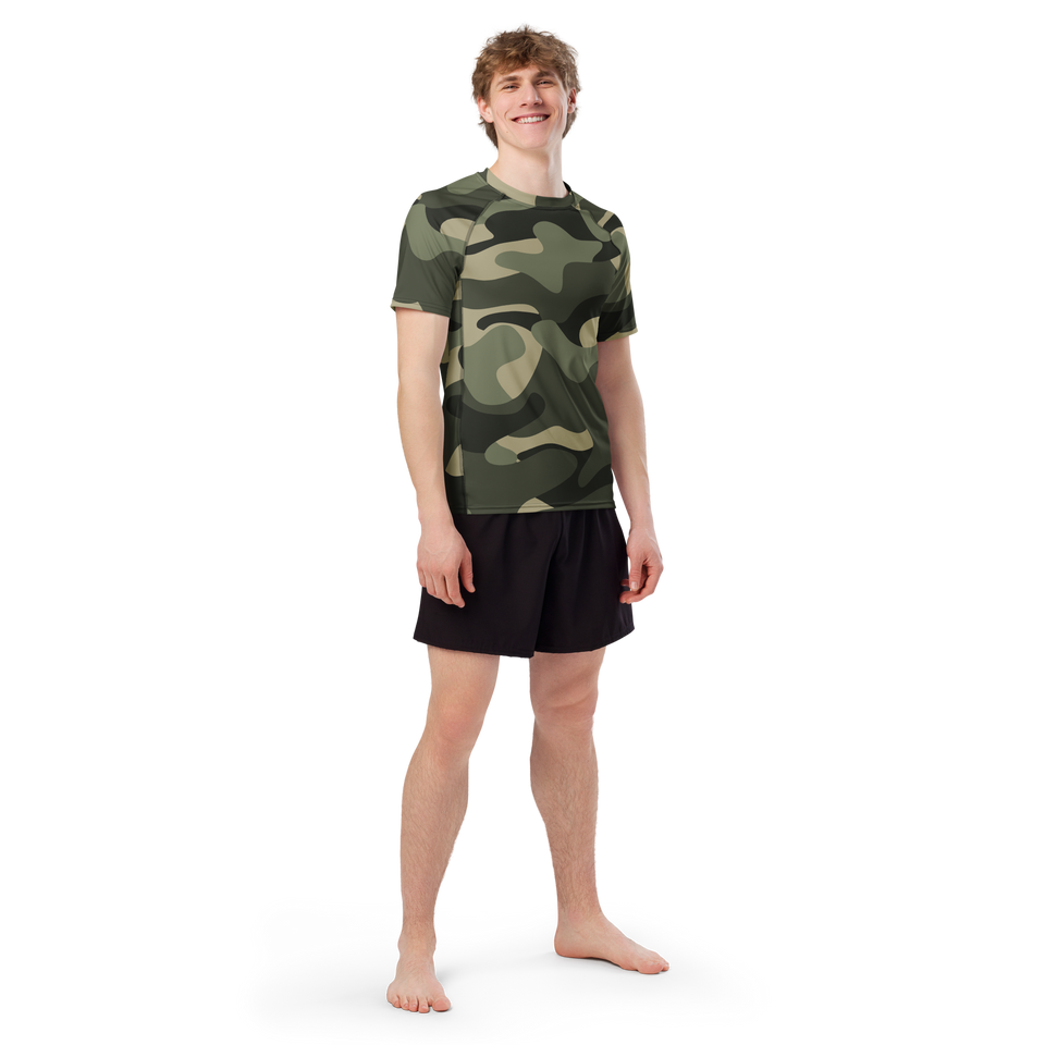 athlete wearing the Anuri Flow Earth Men's Recycled Rash Guard in a green forest camouflage pattern.