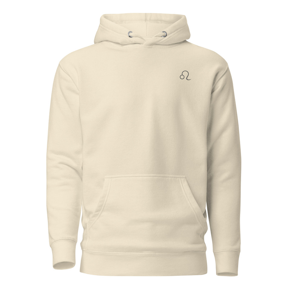 Anuri Elemental Leo Premium Pullover Hoodie in Bone featuring a minimalist Leo zodiac symbol on the left chest with a modern unisex fit.