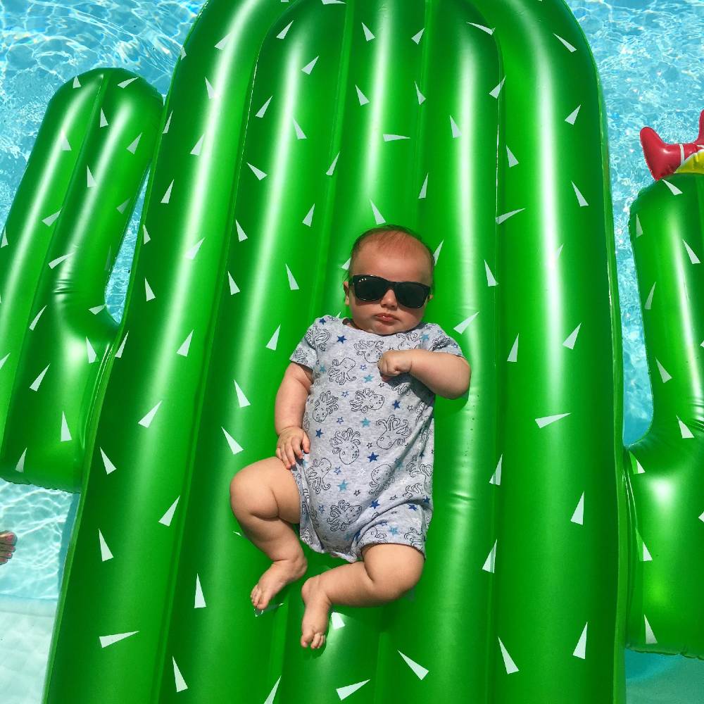 Polarized baby shades, Bueller Black on baby in pool, cactus inflatable