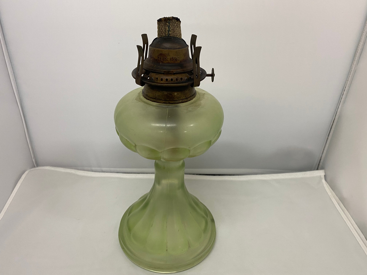 Vintage green shop oil lamp