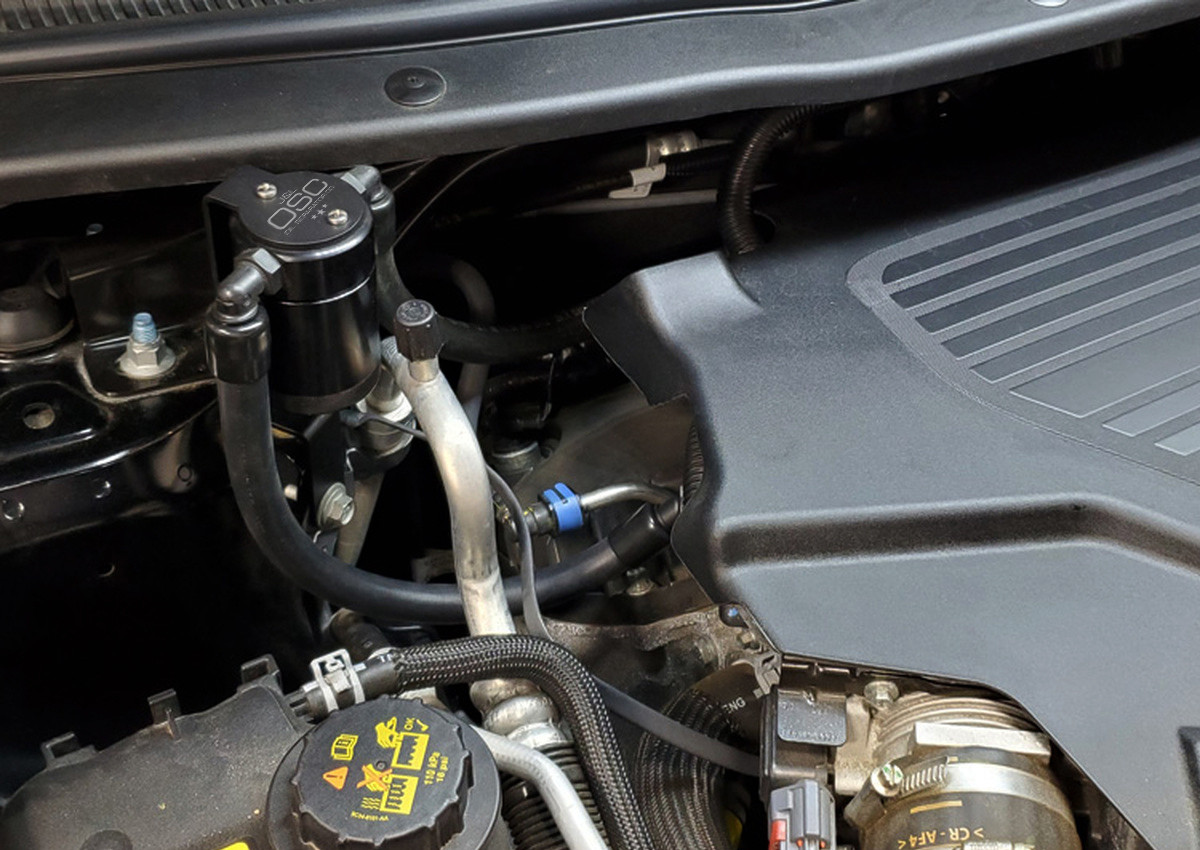 Close-up view of J&L Oil Separator 3.0 Passenger Side (2013-2019 Ford Explorer Sport 3.5L EcoBoost V6) kit in engine bay.