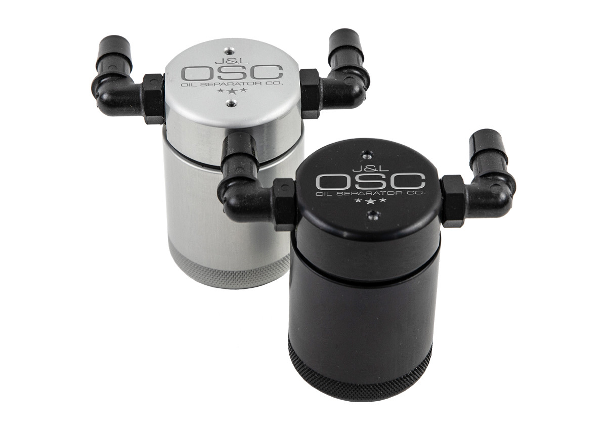 J&L Oil Separator 3.0 Driver Side (2011-2017 F-150 - 5.0L; 6.2L/SVT Raptor, 5.0L & 6.2L/SVT Raptor with Roush Supercharger) canister with hoses on white background.