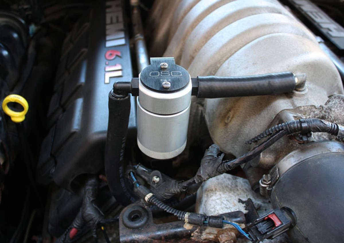 Close-up view of J&L Oil Separator 3.0 Passenger Side (2005-2010 6.1L Hemi SRT8 Dodge Charger, Challenger, 300C, Magnum & Jeep) kit in engine bay.