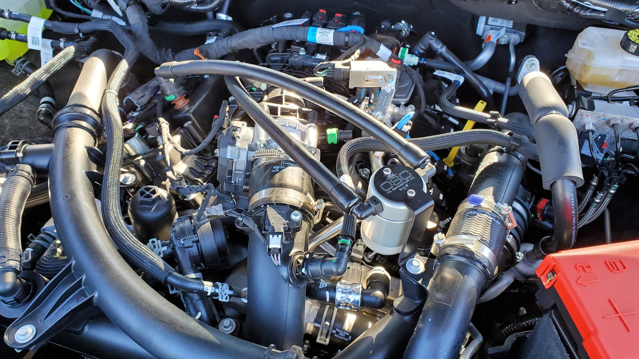 J&L Oil Separator 3.0 PCV Side (2024-2025 Ford Ranger 2.7L EcoBoost)  unit mounted in truck engine compartment.
