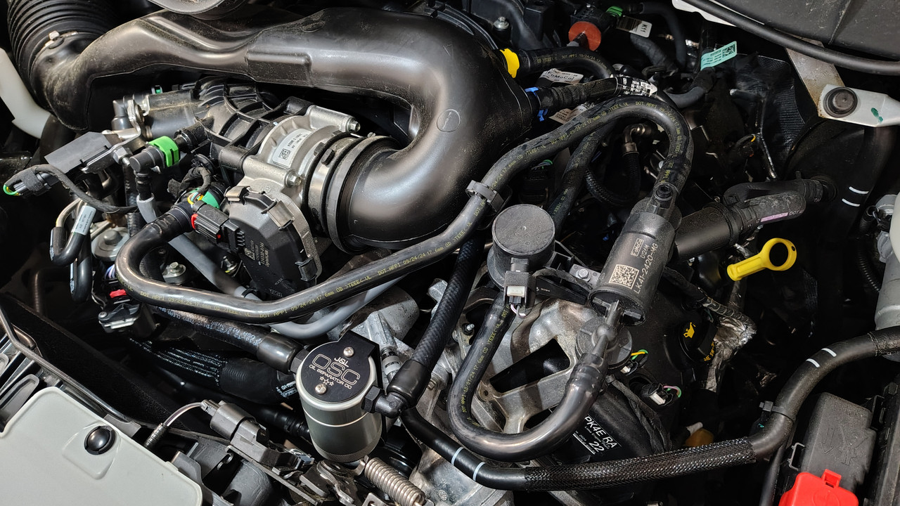 J&L Oil Separator 3.0 (2020-2026 Ford Transit 150/250/350 3.5L Naturally Aspirated)J&L 3.0 Oil Separator('20-'26 Transit 150/250/350 3.5L Naturally Aspirated) unit mounted in van engine compartment.