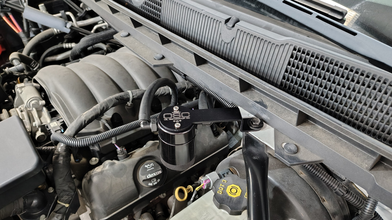 J&L Oil Separator 3.0 PCV Side (2014-2018 Chevy Silverado/GMC Sierra 1500 4.3L) unit mounted in engine compartment.