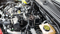 J&L Oil Separator 3.0 PCV Side (2025 Ford Bronco 2.3L; 2025 Ford Ranger 2.3L) unit mounted in vehicle engine compartment.