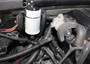 Close-up view of J&L Oil Separator 3.0 Passenger Side (1999-2004 Ford F-150 Lightning; 2002-2003 F-150 Harley Davidson) unit in engine compartment.