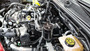 J&L Oil Separator 3.0 PCV Side (2025 Ford Bronco 2.3L; 2025 Ford Ranger 2.3L) unit mounted in vehicle engine compartment.