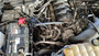 J&L 3.0 PCV side oil separator mounted in the engine bay of a 2018-2020 Ford F-150 5.0L.