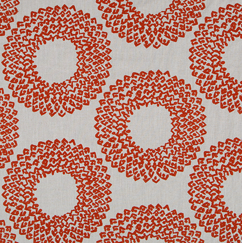 large scale embroidered rings of red on linen background