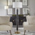 floor lamp carved black with antique brass base, white drum shade