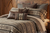The Ironwood Ensemble blends authentic western heritage with refined masculine sophistication, featuring an exclusive, washable wool-blend bedspread and designer pillows