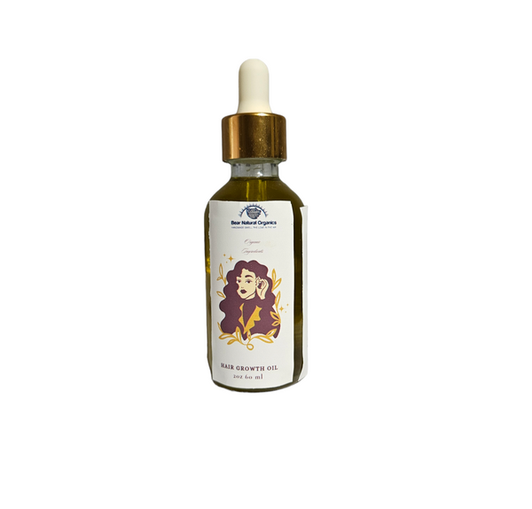 Hair Growth oil in a glass dropper bottle