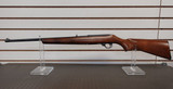 2004 RUGER 10/22 MODEL RIFLE WITH FOLDING ADJUSTABLE LEAF REAR SIGHT PREOWNED